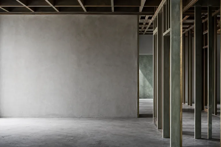 Interior construction area showing framing and wall conditions